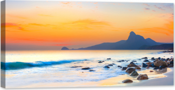 Tablou luminos in intuneric GlowforHome Panorama cu pietre pe plaja si mare la asfintit 80 cm x 40 cm 