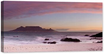 Tablou luminos in intuneric GlowforHome Peisaj Incredibil plaja si munte in culori violet Dolphin Beach Cape Town Africa 120 cm x 60 cm 