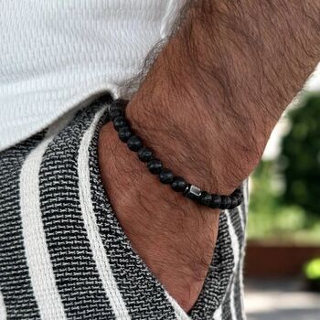 Bratara barbati ajustabila pe snur Cian din pietre de lava cu charm inox