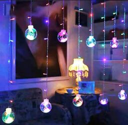 Instalație de Crăciun perdea luminoasă 10 becuri cu Mos Crăciun lungime 3m Tip lumina - RGB-multicolor